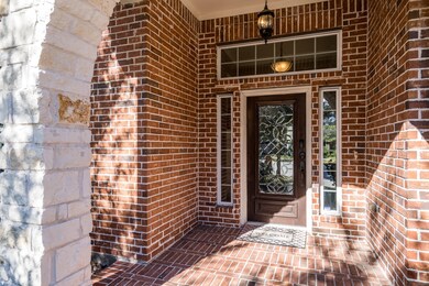 Covered Patio with elegance leaded glass mahogany door.