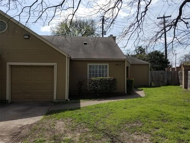 View of front of property featuring concrete driv