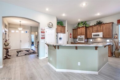 Kitchen with Breakfast Bar & Pantry. Open to Livin