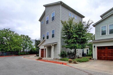 View of front of home with central AC unit