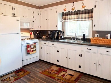 Spacious eat-in kitchen with ample cabinet space.