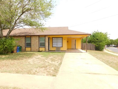 Single story home featuring driveway, an attached