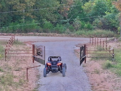 View of property's community featuring a gate