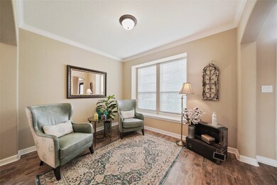 As you enter the home, the formal living room (12x10) is to your right and offers a space away from it all for studying, reading or quiet moments of contemplation.  Crown molding throughout the first floor adds a fine finish to this exquisite home.