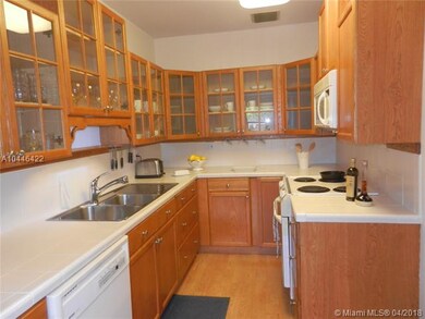 Light & bright kitchen with pretty cabinets!