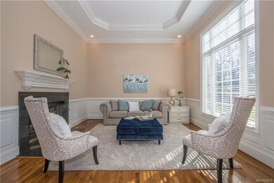 Living Room with 12' ceiling, tray ceiling, gas fi