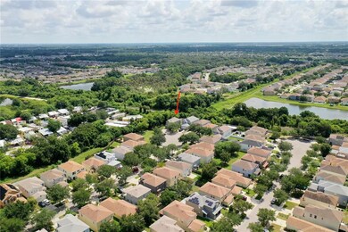 Aerial view of property and neighborhood