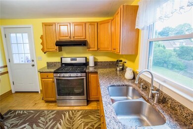 From the mudroom you enter the fully updated kitch