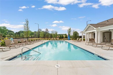 Community pool with a patio area in cabana