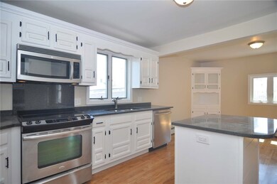 Kitchen with center island for additional sitting