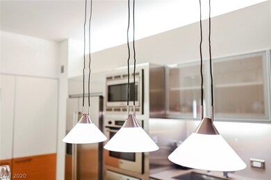 Custom lighting over built in dining table.