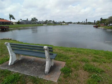 park bench overlooking Claw Lake across the street