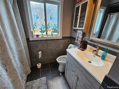 Entry level bathroom with shower