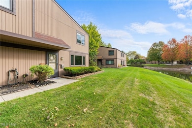 View of grassy yard featuring a water view
