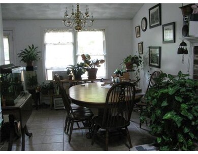 Dining Room. Unit #2 has ceramic tile floor,chande