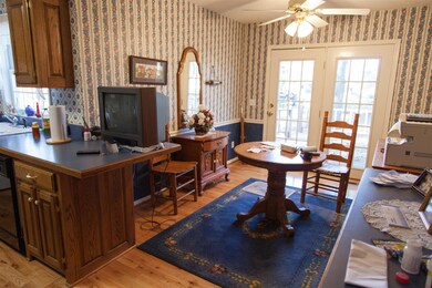 Another view of the eat in area off of the kitchen with access to the back deck.