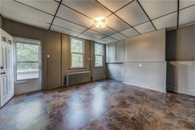 Above grade basement could be 3rd bedroom or play 