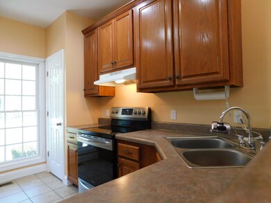 Spacious counter top with corner sink. A view to the backyard can be enjoyed from the sink.