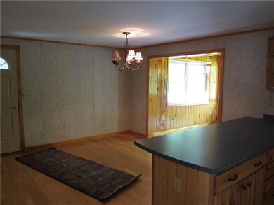 Dining space open to sunroom