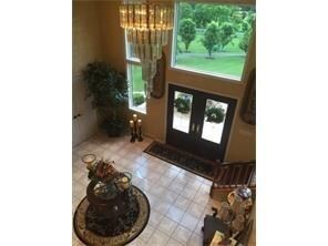 Impressive 2-story foyer makes a statement ~