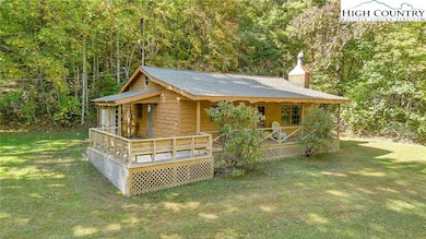 411 Misty Jump Ln, Millers Creek, NC 28651 - photo 2