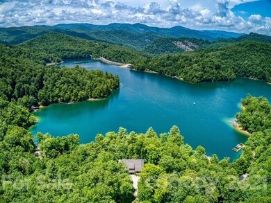 Drone photography of house and wolf lake.  (colors