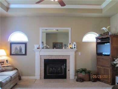 Living Room. Warm in the glow of the fireplace - w
