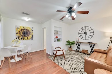 Sitting room with built in features, light wood-s