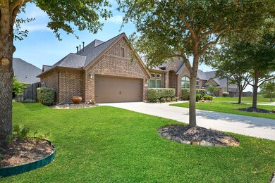 Beautiful curb appeal with manicured landscaping.