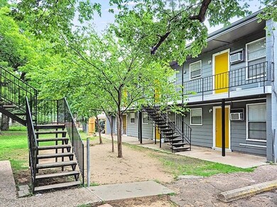 View of community featuring a patio area and stai
