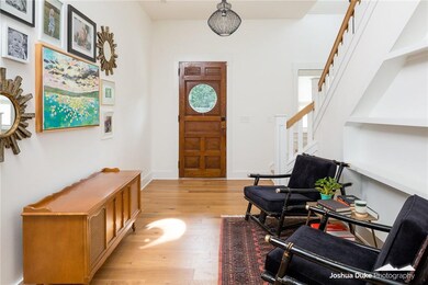 Entry way. Take note of all the antique doors.