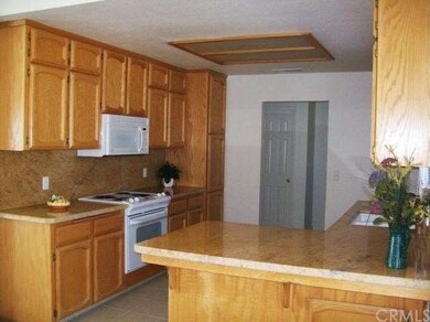 Beautiful kitchen with tile floor and granite coun