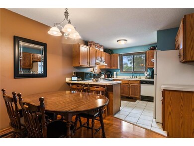 Open concept kitchen with window overlooking the o