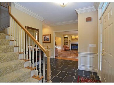 Entry/Foyer. The slate tiled entry features dentil
