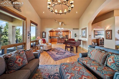 Living Room opens to Kitchen & overlooks the Deck