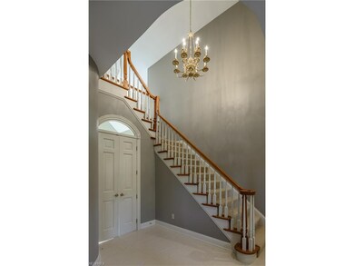 Front entry features open staircase and new popula
