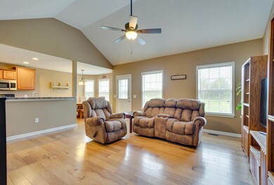 Huge open living room with beautiful hardwood floors