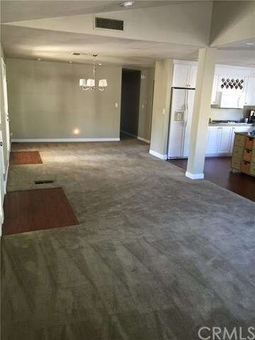 View from front of living room, to dining room.