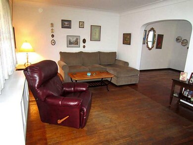 Living Room. The Arched Doorways and Cove Ceilings