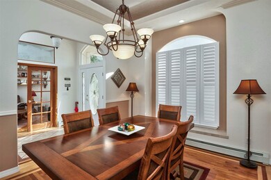 Plantation shutters cover all the front windows, w