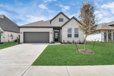 Newly constructed single-story home with a two-car
