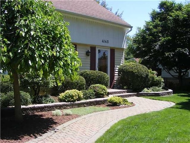 Exterior Front. Welcome Home!  Paver Driveway, Wal