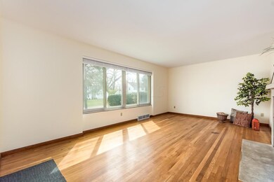 Huge Picture Window Overlooks Front Yard