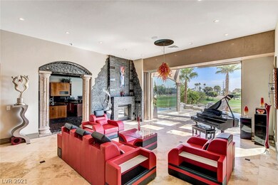 Living room leads into kitchen and family room