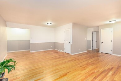 Another peek at the Spacious home with OPEN Floor Plan and Beautiful Wood Flooring. Move in Ready!