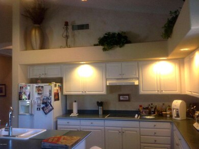 Island Kitchen with Pot Shelves