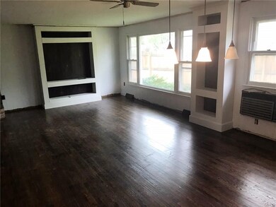 The family room opens to the dining room area, wit