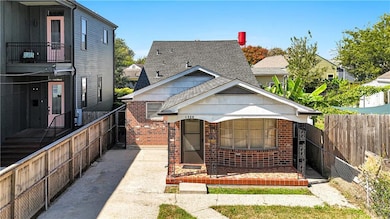 Bywater Camelback Brick Ranch with Primary Bedroom and Bathroom on the upper level offers privacy allowing more space on the first level for a large kitchen, living room, dining room and family room.