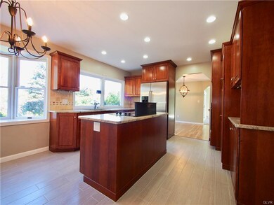 Center Island Kitchen looking into Dining Room