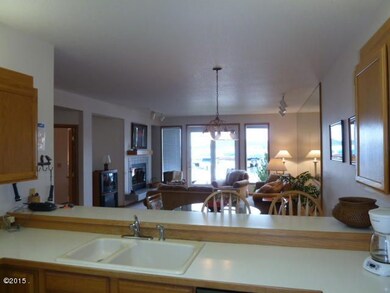 Kitchen to Dining and Living Area